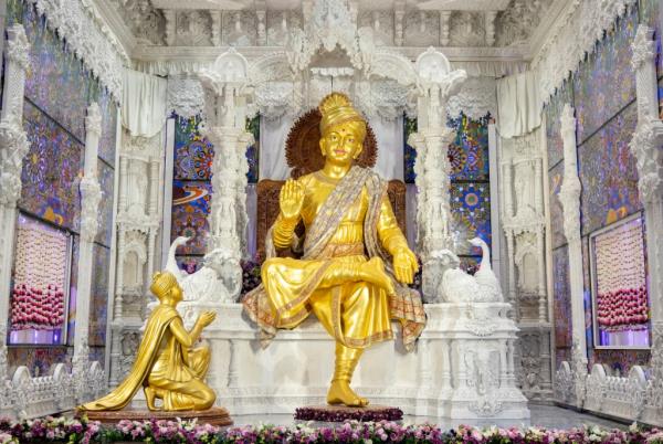 Statues of Hindu dieties adorn the interior of the Akshardham Mahamandir temple.