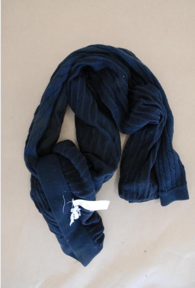 Photo of dark tights. Canadian Forces investigators photographed these tights that Elle Jaszberenyi said she wore during the May 2018 alleged sexual assault incident. Cpl. Oleksii Silin testified that Jaszberenyi wore jeans.